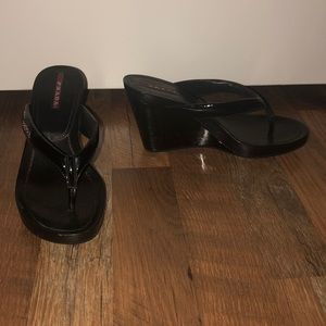 Black high platform open toed Prada’s